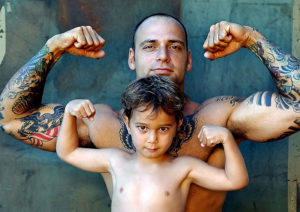 dad and son flexing how to lose weight fast for men