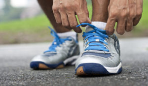 how to start losing weight for men tying running shoes 