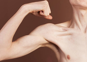 skinny man flexing cardio workout for men