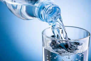 water pouring into glass workout tips for men