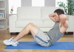 man working out it home get back in shape