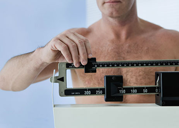 man on scale best body measurements for men