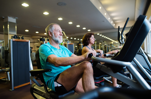 old man on exercise bike cardio workout for men