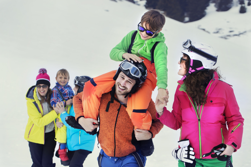 ski fitness two families with children walking in the snow